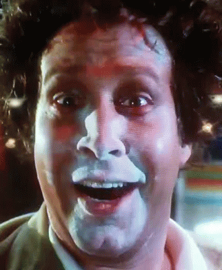 A Close Up Of A Man 'S Face With White Paint On His Face GIF