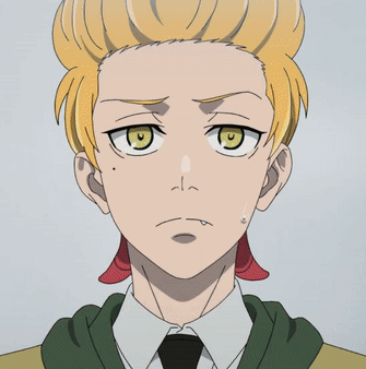 A Close Up Of A Man 'S Face With Yellow Hair GIF