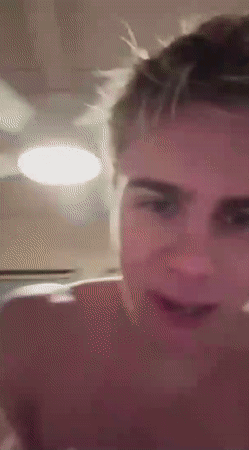A Close Up Of A Man 'S Face Without A Shirt On GIF