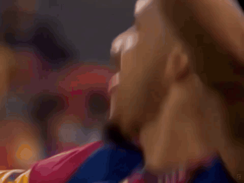 A Close Up Of A Man 'S Head With A Blurry Background GIF