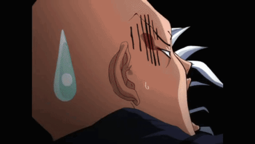 A Close Up Of A Man 'S Head With A Tear Coming Out Of His Eye GIF