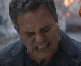 A Close Up Of A Man 'S Neck And Neckline GIF