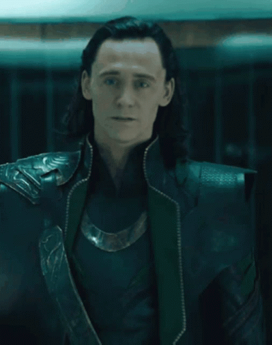A Close Up Of A Man Wearing A Black And Green Outfit GIF