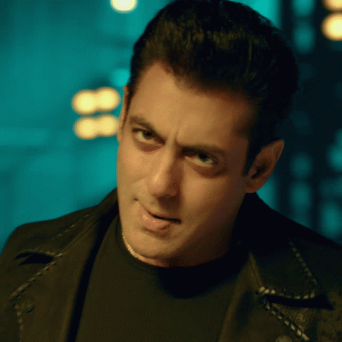 A Close Up Of A Man Wearing A Black Shirt And A Black Leather Jacket GIF