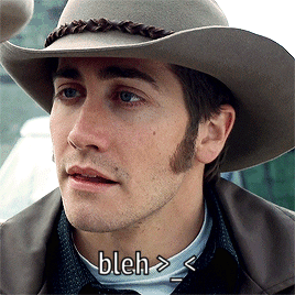 A Close Up Of A Man Wearing A Cowboy Hat With Bleh Written Below Him GIF