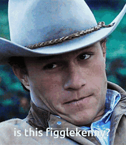 A Close Up Of A Man Wearing A Cowboy Hat With The Words Is This Figglekenny On The Bottom GIF