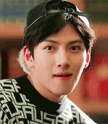 A Close Up Of A Man Wearing A Hat And A Sweater . GIF