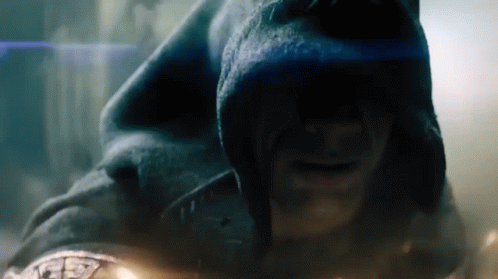 A Close Up Of A Man Wearing A Hood And Smiling GIF