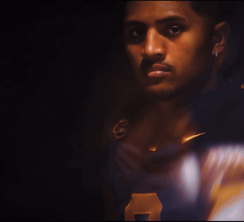 A Close Up Of A Man Wearing A Jersey With The Number 7 On It GIF