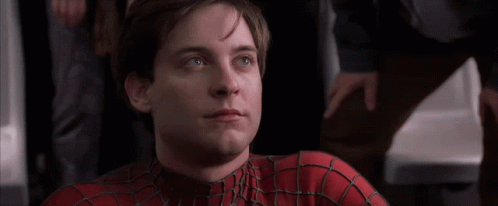 A Close Up Of A Man Wearing A Spiderman Costume GIF