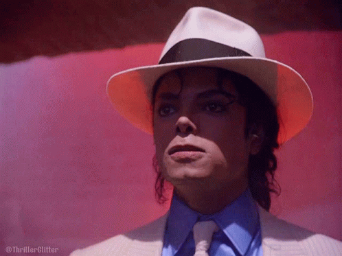 Close Up Of Man In White Hat And Blue Tie GIF