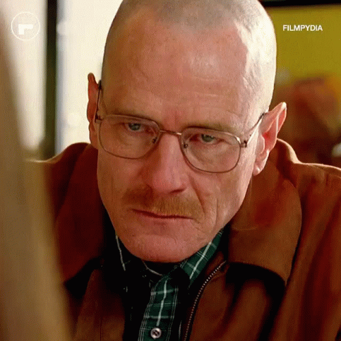 A Close Up Of A Man Wearing Glasses And A Plaid Shirt With Filmpydia Written On The Bottom GIF