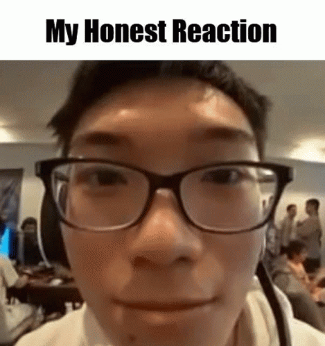 A Close Up Of A Man Wearing Glasses And Making A Face . GIF