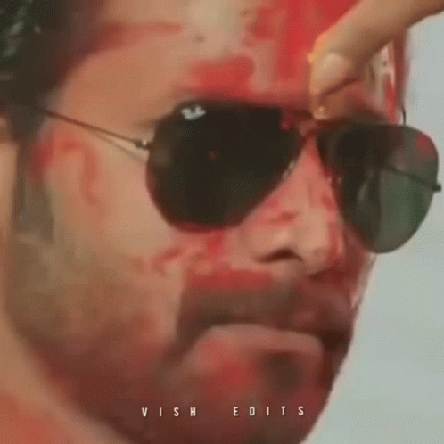 Man With Sunglasses And Red Face Paint GIF