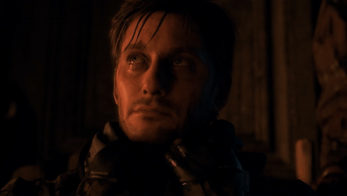 A Close Up Of A Man With A Bandana Around His Head GIF
