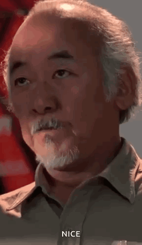 A Close Up Of A Man With A Beard And Mustache Making A Face . GIF