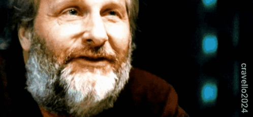 A Close Up Of A Man With A Beard And The Year 2014 GIF