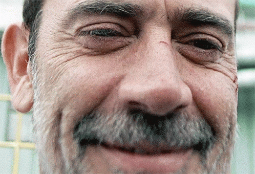 A Close Up Of A Man With A Beard Smiling GIF