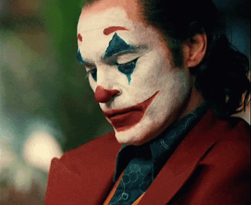 Close-Up Of Man With Clown Face Paint GIF