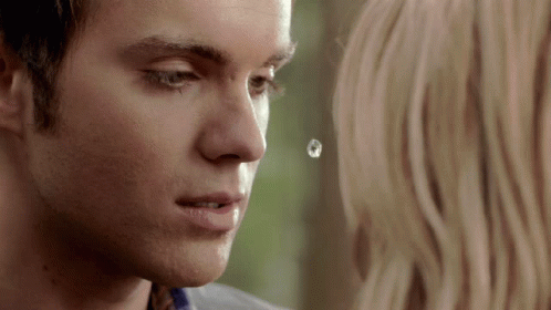 A Close Up Of A Man With A Drop Of Water On His Nose GIF