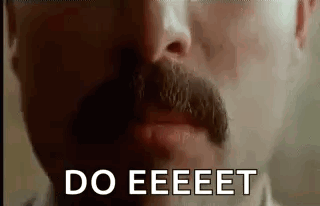 A Close Up Of A Man With A Mustache Saying `` Do Eeeet '' . GIF