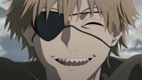 A Close Up Of A Man With An Eye Patch And Sharp Teeth Smiling GIF