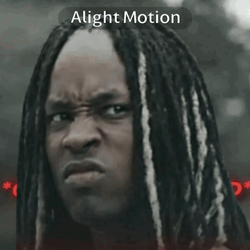 A Close Up Of A Man With Dreadlocks And The Words Ohio Unimpres GIF