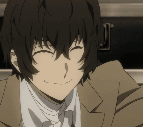A Close Up Of A Man With His Eyes Closed Smiling GIF