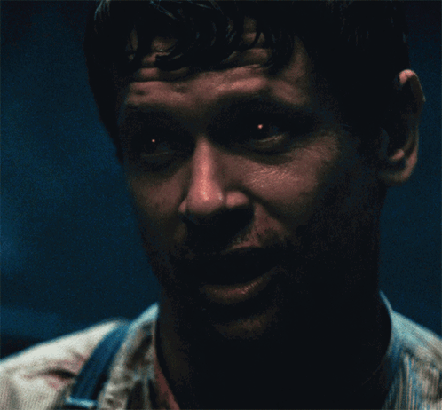 A Close Up Of A Man With His Mouth Open GIF