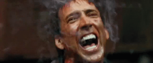 A Close Up Of A Man With His Mouth Open GIF