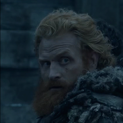 A Close Up Of A Man With Red Hair And Beard GIF
