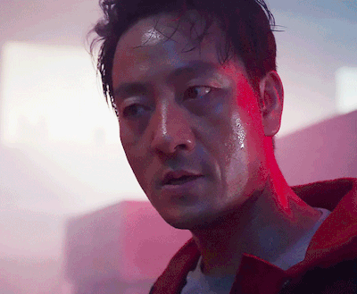 A Close Up Of A Man With Sweat On His Face GIF