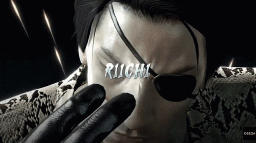 A Close Up Of A Man With The Word Richi On His Face GIF