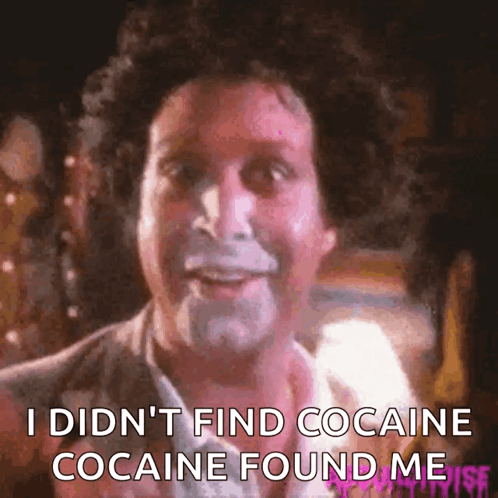 A Close Up Of A Man With The Words " I Did N't Find Cocaine Cocaine Found Me " On The Bottom GIF
