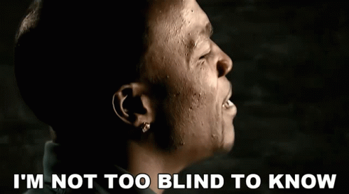 A Close Up Of A Man With The Words I 'M Not Too Blind To Know Below Him GIF