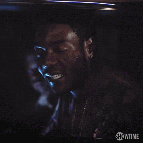 A Close Up Of A Man With The Words Imma Holla At You On The Bottom GIF