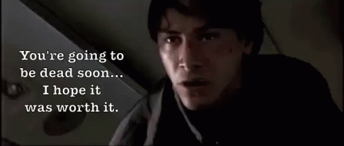 A Close Up Of A Man With The Words You 'Re Going To Be Dead Soon ... I Hope It Was Worth It . GIF