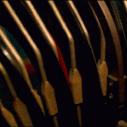 A Close Up Of A Mechanical Device With The Number 1 On The Bottom GIF