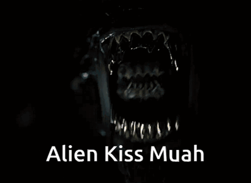 A Close Up Of A Monster Mouth With The Words Alien Kiss Muah Below It GIF