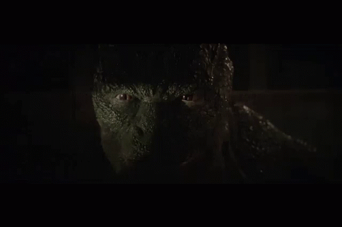 A Close Up Of A Monster 'S Face With The Words And So It Begins Below It GIF