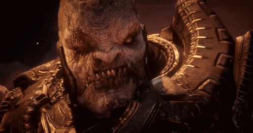 A Close Up Of A Monster With A Tire On His Back GIF