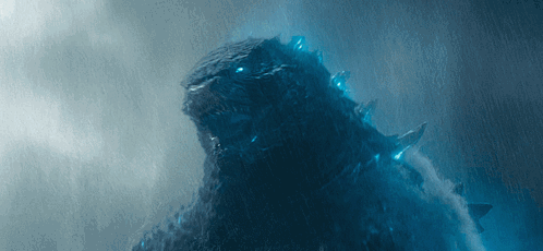 A Close Up Of A Monster With Blue Lights On It 'S Head GIF