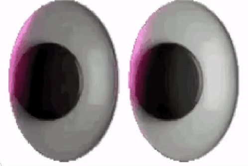 A Close Up Of A Pair Of Cartoon Eyes With A Pink Glow In The Middle . GIF