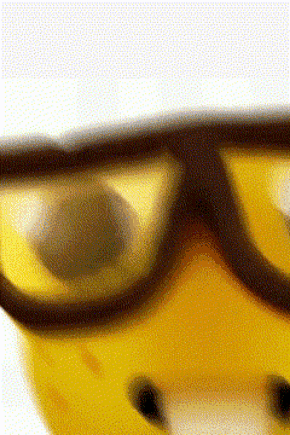 A Close Up Of A Pair Of Safety Goggles On A Yellow Helmet GIF