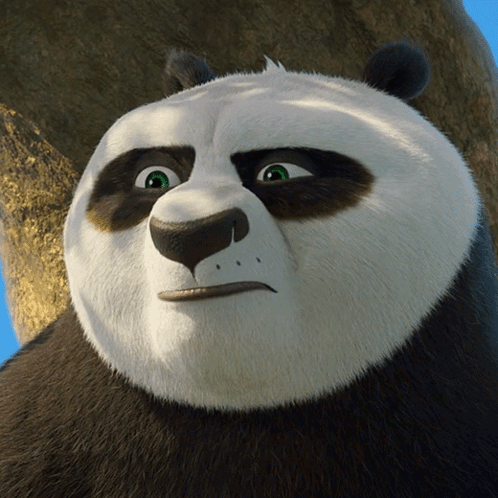 A Close Up Of A Panda Bear With A Serious Look On His Face GIF
