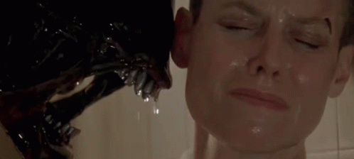 A Close Up Of A Person Being Attacked By A Monster In A Shower . GIF