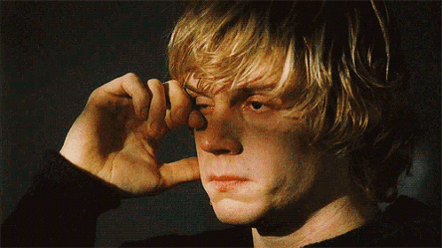 A Close Up Of A Person Covering Their Ears GIF
