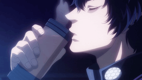 A Close Up Of A Person Drinking From A Coffee Cup GIF