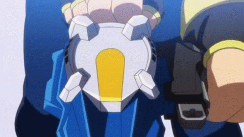 A Close Up Of A Person Holding A Blue And White Object In Their Hand . GIF