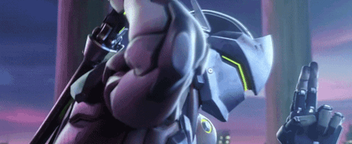 A Close Up Of A Person Holding A Gun In Their Hand And Giving A Peace Sign . GIF